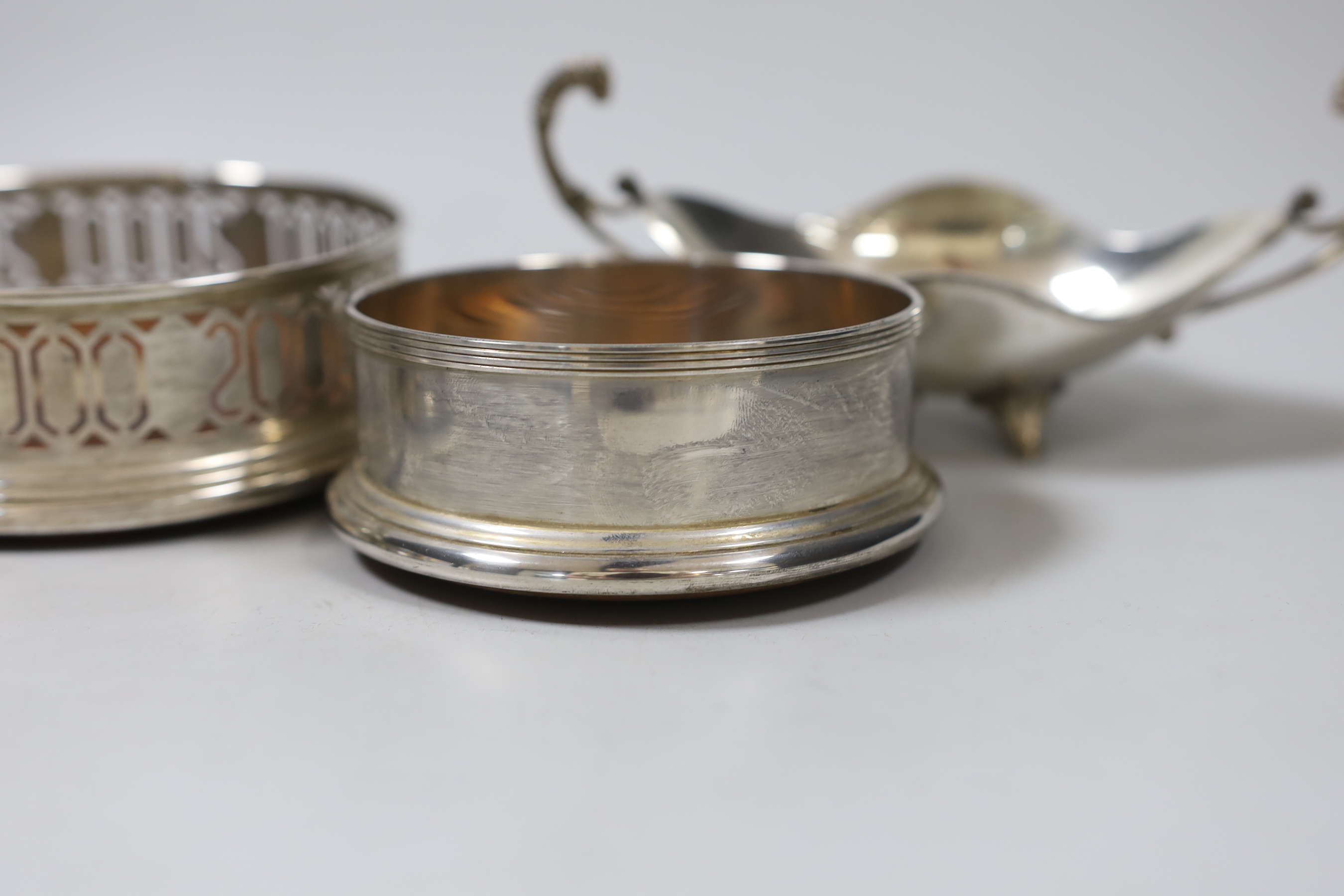 Three modern silver coasters, largest 12.2cm., a modern 925 dish and cup.